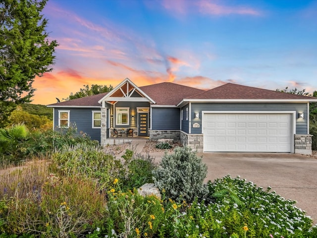 view of front of property with a garage