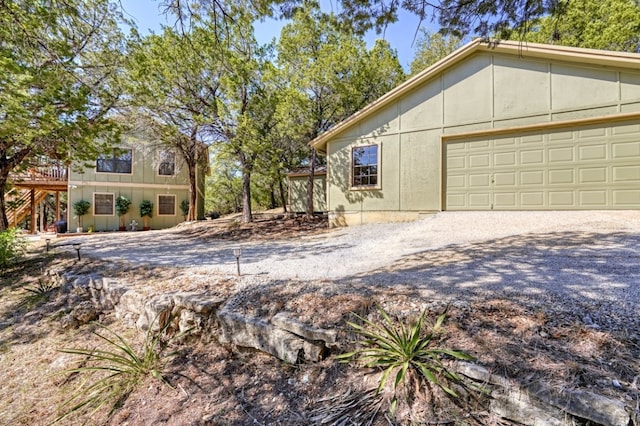 view of property exterior with a garage