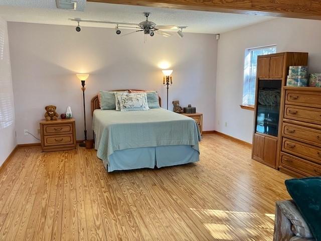 bedroom with light hardwood / wood-style floors