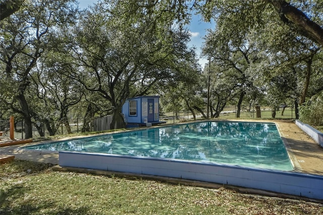 view of pool with fence and a fenced in pool