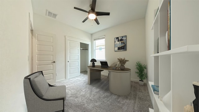 home office with carpet and ceiling fan