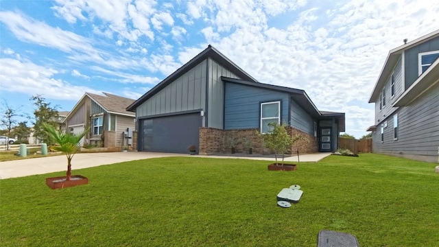 view of front facade with a front lawn and a garage