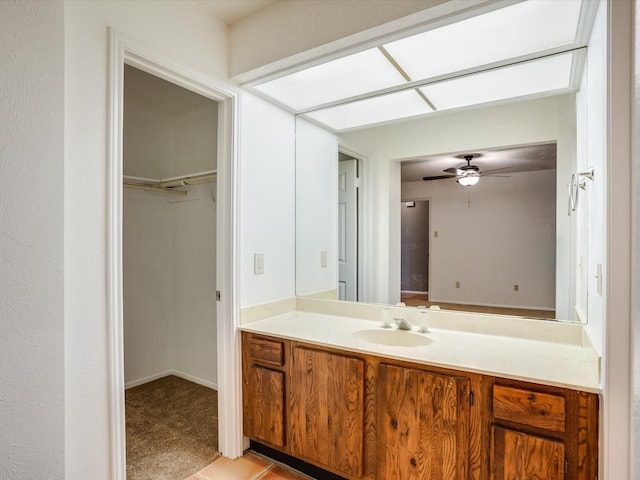 bathroom with vanity and ceiling fan