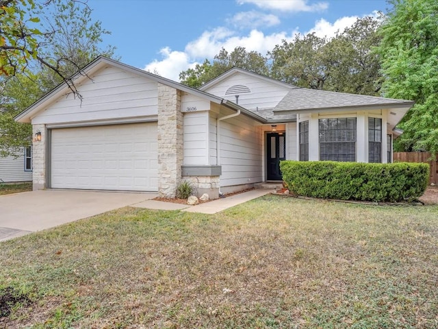 3606 Lovage Dr, Austin, TX 78727 - ranch-style house with an attached garage, concrete driveway, a front yard, and roof with shingles