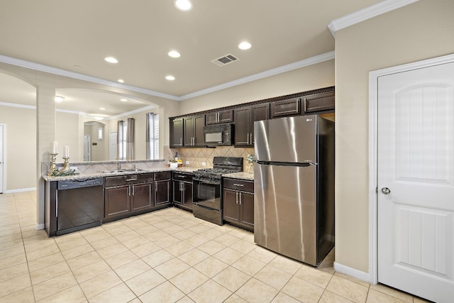 kitchen featuring dark brown cabinetry, light stone counters, light tile patterned flooring, and black appliances