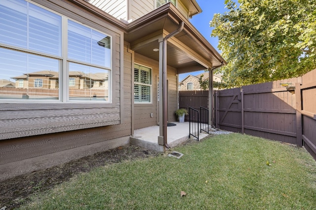 view of home's exterior featuring a yard