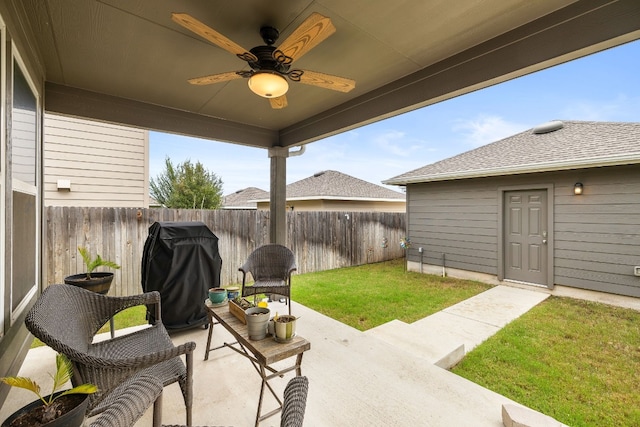 view of patio featuring grilling area and ceiling fan