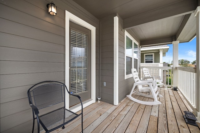 wooden deck featuring a porch