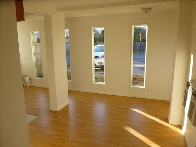 7403 Guadalupe St, Austin, TX 78752 - spare room with light wood-type flooring and baseboards