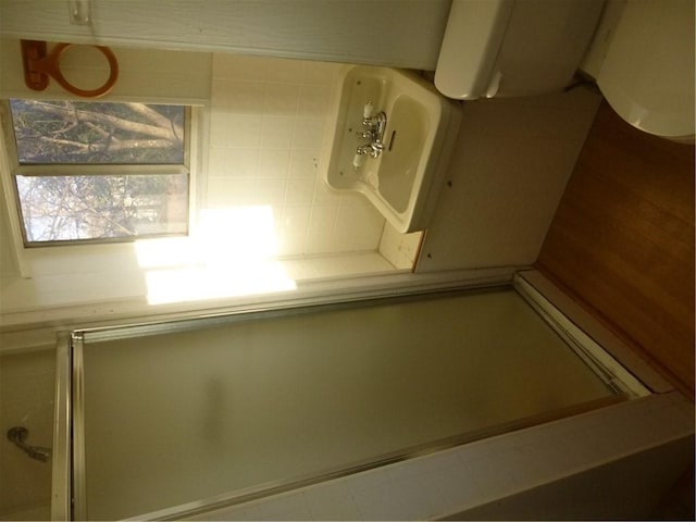 7403 Guadalupe St, Austin, TX 78752 - bathroom featuring a shower with door