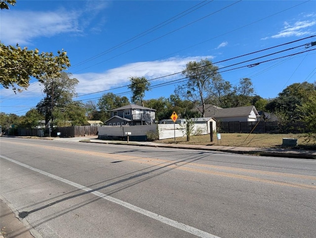 7403 Guadalupe St, Austin, TX 78752 - view of asphalt street with sidewalks, curbs, and traffic signs