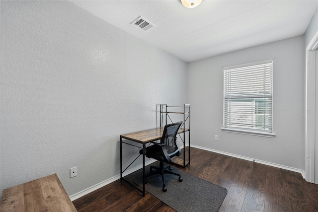 office space with dark hardwood / wood-style floors