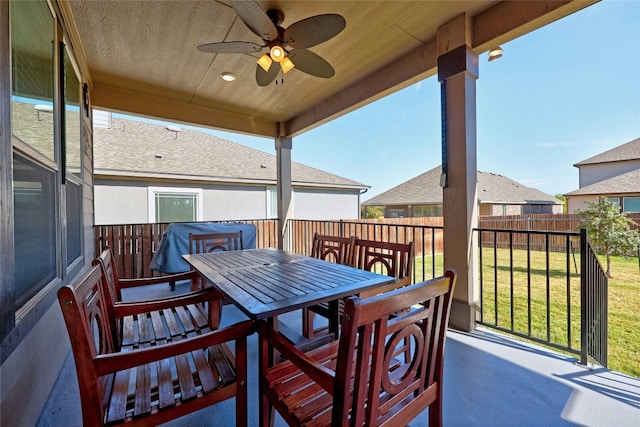 view of patio featuring ceiling fan