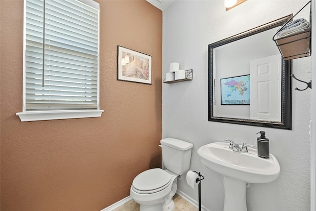 bathroom featuring toilet