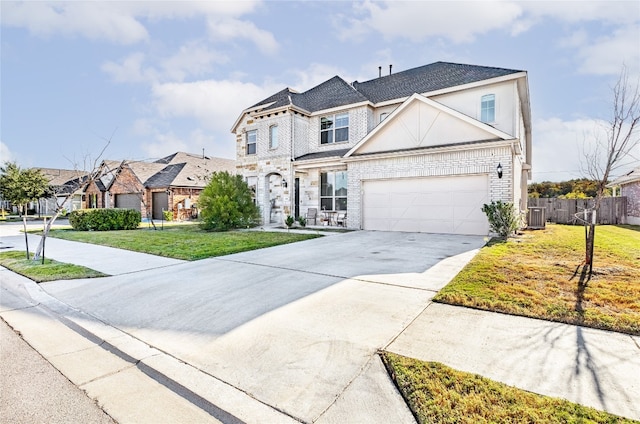 front of property featuring a garage, cooling unit, and a front lawn