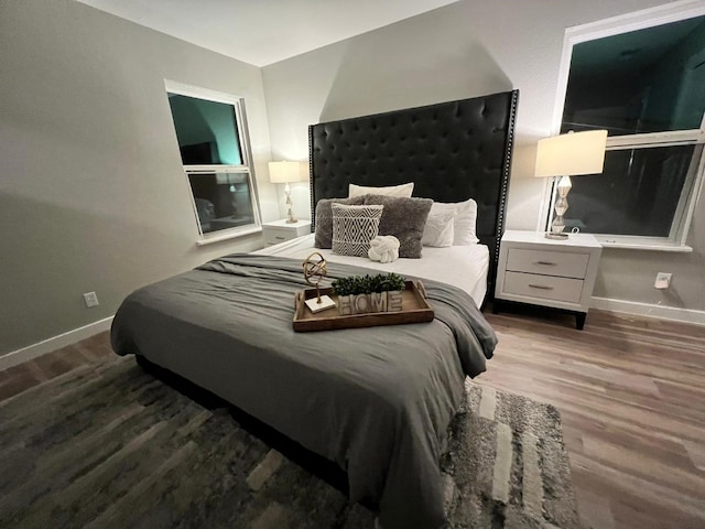 bedroom featuring wood-type flooring