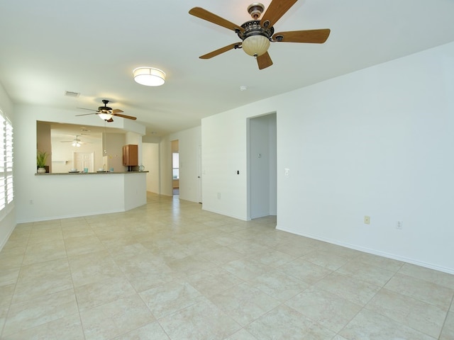 unfurnished living room with light tile patterned floors