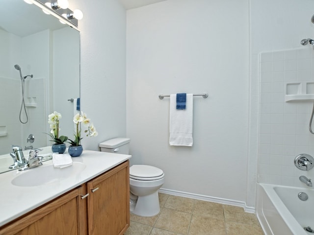 full bathroom with vanity, tile patterned flooring, toilet, and tiled shower / bath