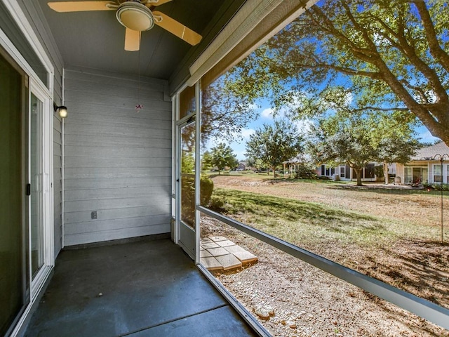 119 Hampton Cir, Georgetown, TX 78633 - unfurnished sunroom featuring a ceiling fan