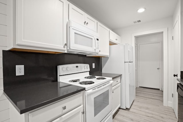 kitchen featuring white cabinetry, white appliances, and light hardwood / wood-style floors