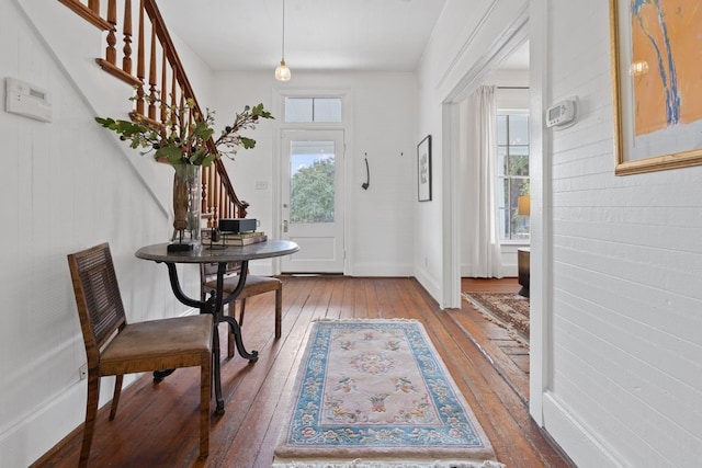 entrance foyer featuring hardwood / wood-style floors and plenty of natural light