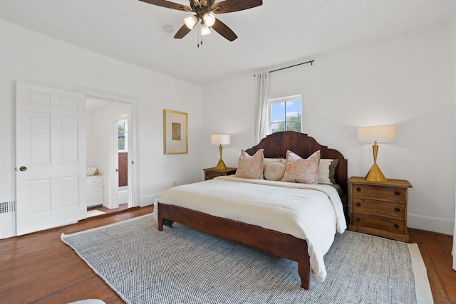 bedroom featuring dark hardwood / wood-style flooring and ceiling fan