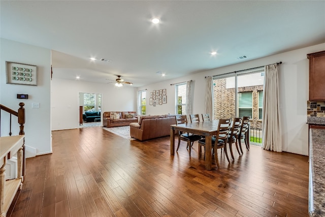 dining room featuring ceiling fan and wood-type flooring