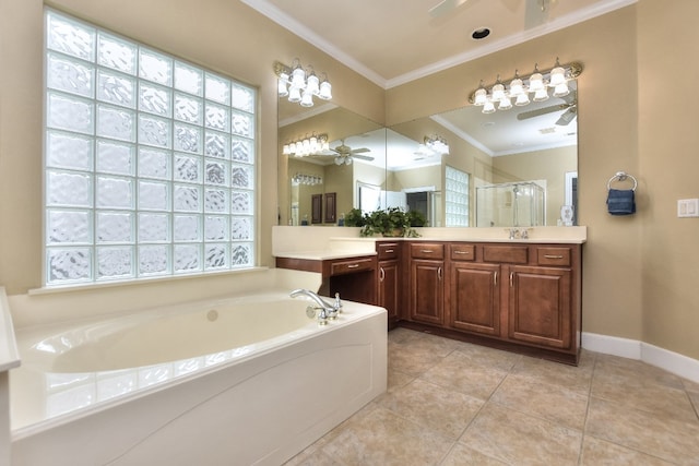 bathroom with vanity, tile patterned flooring, crown molding, and separate shower and tub