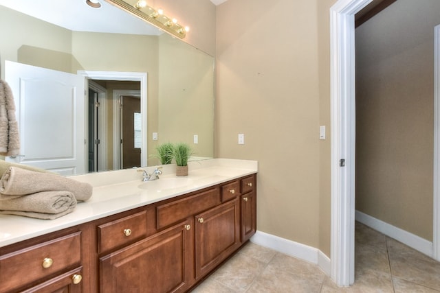 bathroom with vanity and tile patterned floors