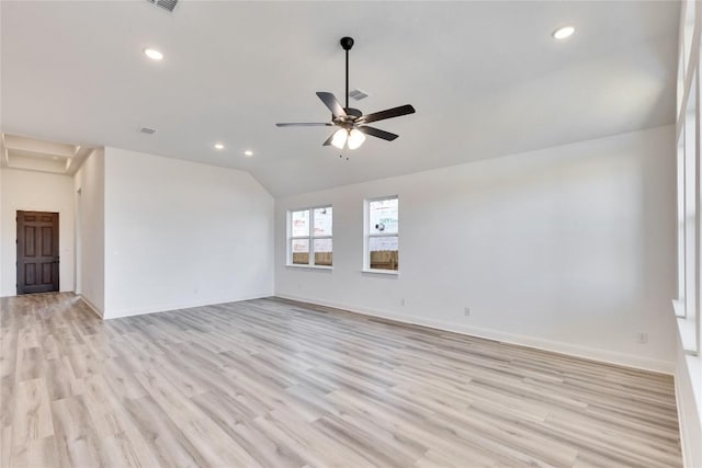 spare room with baseboards, recessed lighting, ceiling fan, vaulted ceiling, and light wood-type flooring