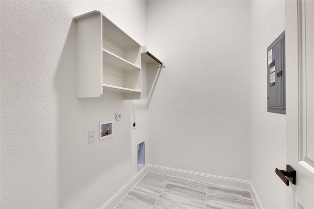 laundry area with baseboards, laundry area, electric dryer hookup, washer hookup, and hookup for a gas dryer