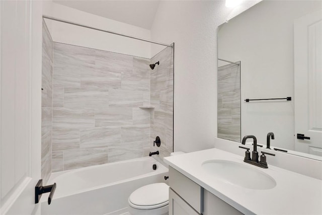 full bath featuring toilet, vanity, and  shower combination