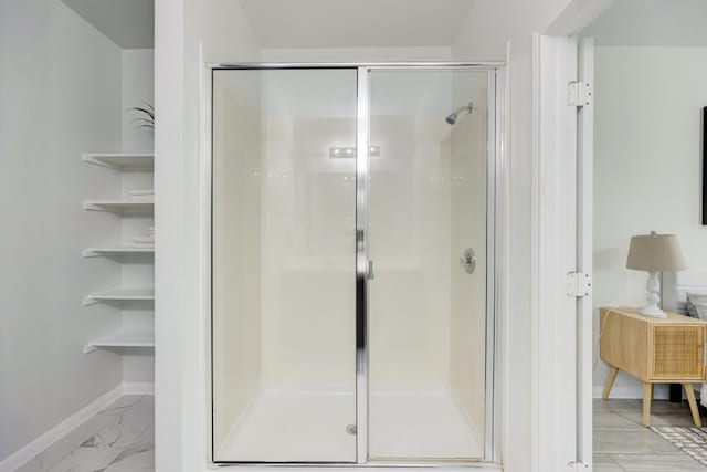 bathroom with an enclosed shower