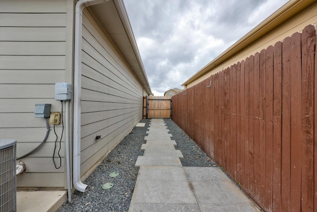 view of side of property featuring central AC unit