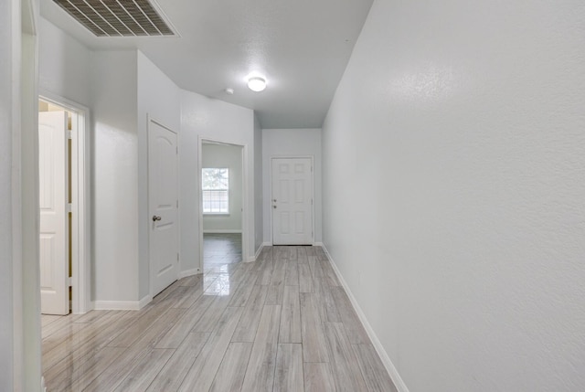 hall featuring light hardwood / wood-style floors