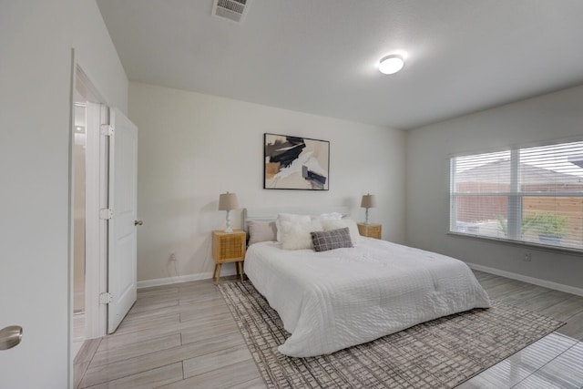 bedroom featuring light wood-type flooring