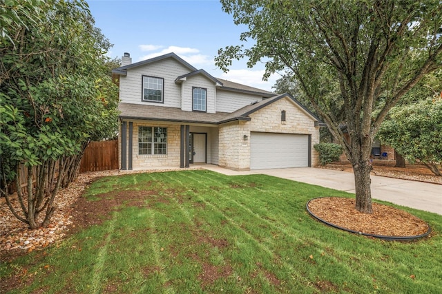 view of front facade with a garage and a front yard