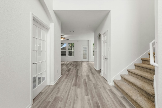 hall featuring light hardwood / wood-style floors