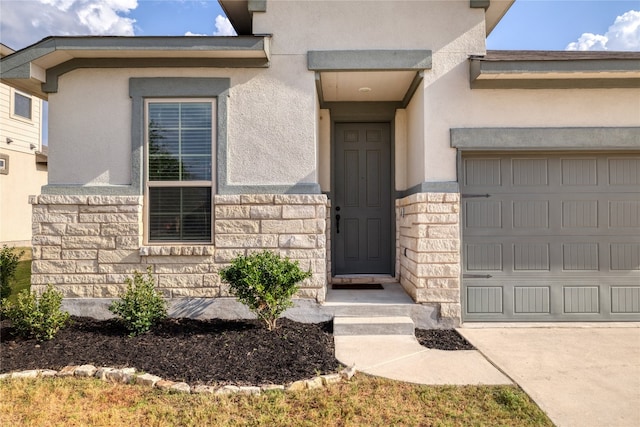 entrance to property with a garage