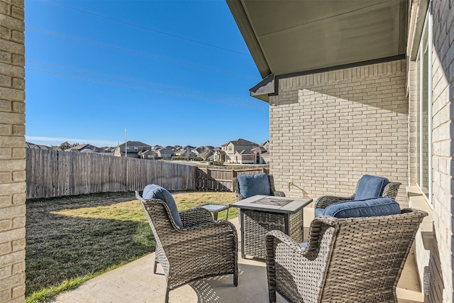 view of patio with a fire pit