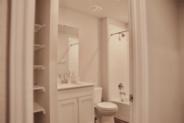 full bathroom featuring vanity, toilet, and shower / bath combination