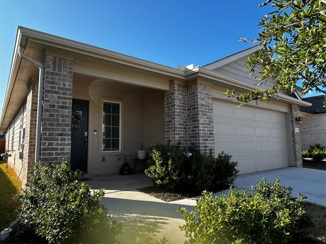 ranch-style home with a garage