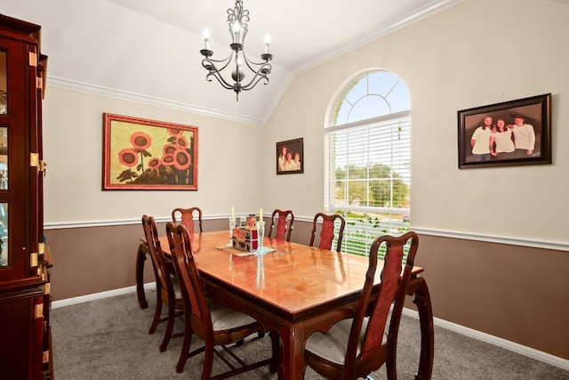 carpeted dining space featuring a chandelier, lofted ceiling, and crown molding