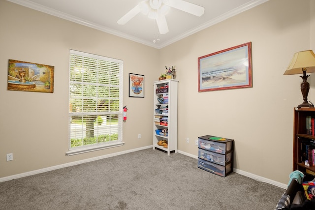 misc room with ceiling fan, light colored carpet, and ornamental molding