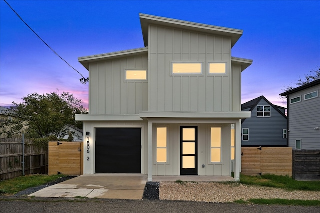 view of front of property with a garage