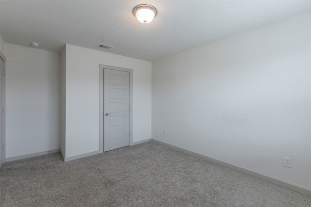 spare room with carpet flooring