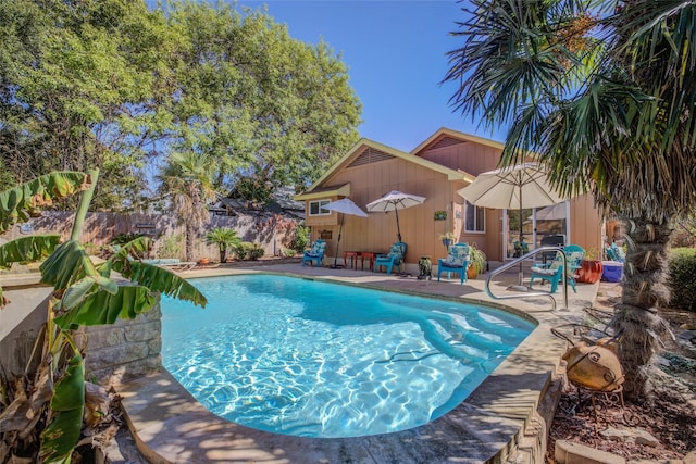 view of pool featuring a patio