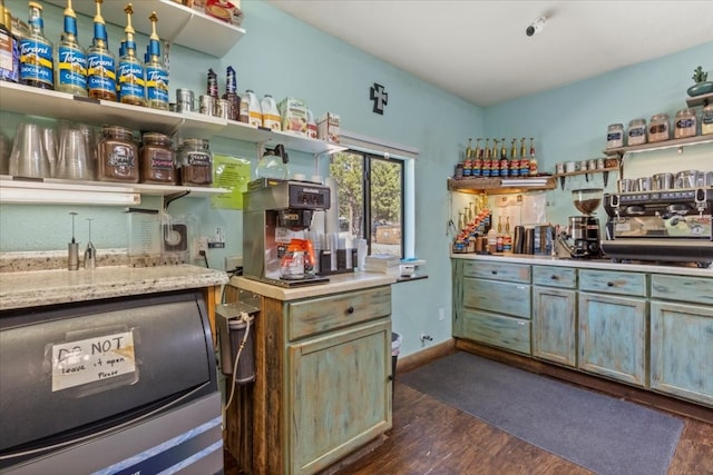 bar featuring dark wood-type flooring