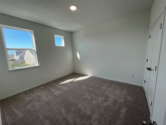 view of carpeted spare room