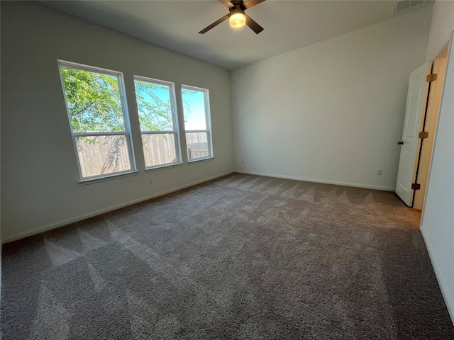 carpeted empty room with ceiling fan